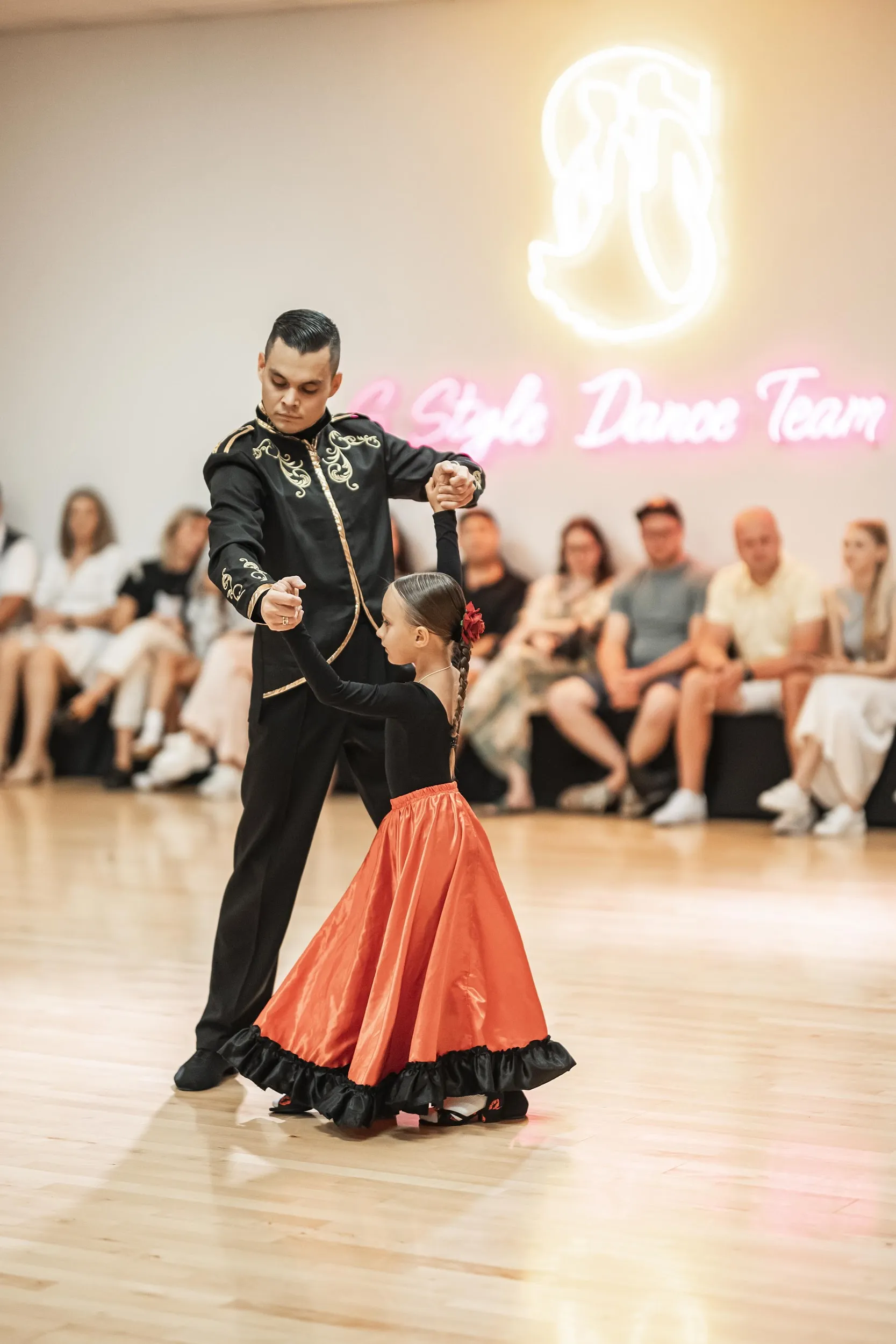 A young student performing with Marat Zhumabekov at Summer Showcase 2024